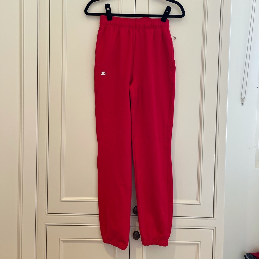 Red Starter sweatpants